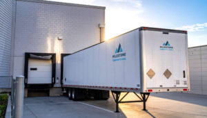 Milestone semi-trailer rental at loading dock for short-term storage